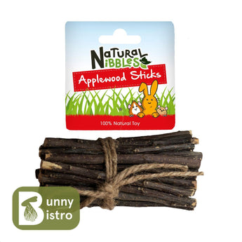 Natural Nibbles Applewood Sticks, a bundle of applewood sticks tied with string in hanging retail packaging.
