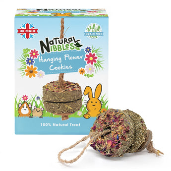 Natural Nibbles Hanging Flower Cookies for small pets. Two round, grain-free forage treats on natural twine, displayed next to their light blue packaging.