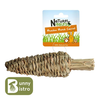 Natural Nibbles Meadow Munch Carrot, a dried grass woven carrot in hanging retail packaging.