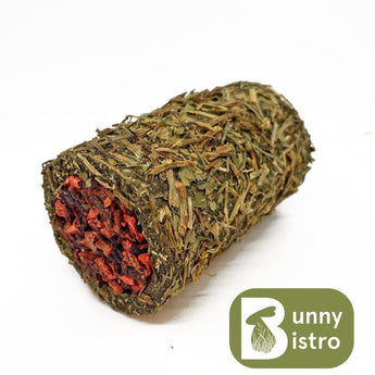 Bunny Bistro Herbal Forage Tunnels, a hay tunnel covered in herbal forage and stuffed with dried leaves and vegetables.