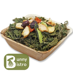 Bunny Bistro Healthy Salad Bowl, palm bowl filled with leaf mix and topped with dried fruit and veg.